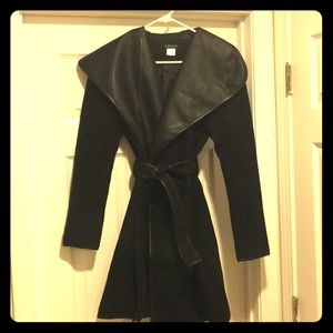 Black coat with leather trim and tie belt